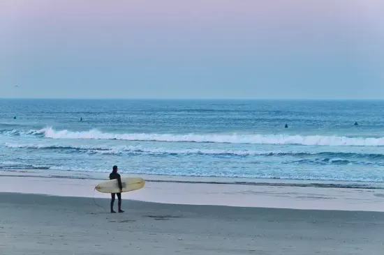 sunrise surfer